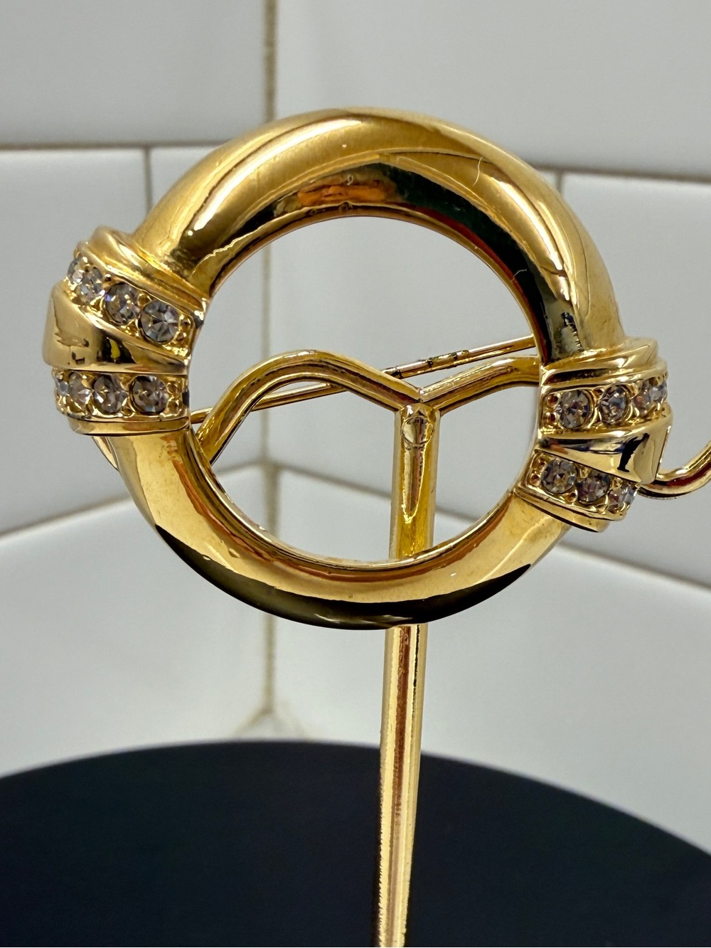 AVON 100th Anniversary Gold-Tone Circle Brooch with Clear Rhinestones
